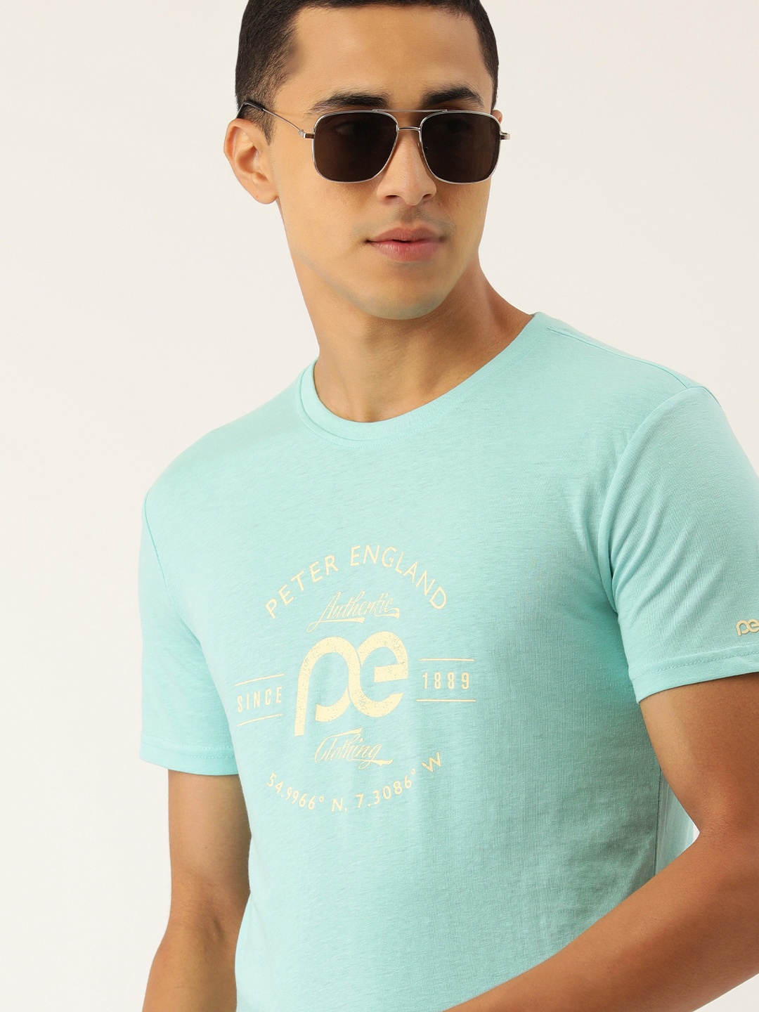 

Peter England Casuals Men Mint Green Brand Logo Printed T-shirt