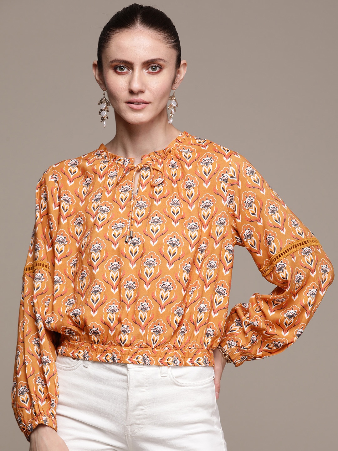 

Label Ritu Kumar Mustard Yellow Print Tie-Up Neck Blouson Crop Top