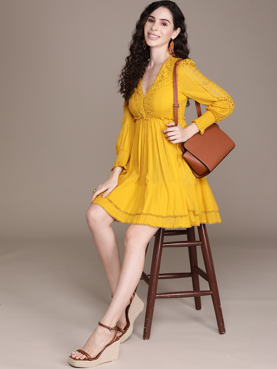 

Label Ritu Kumar Yellow Solid A-Line Dress