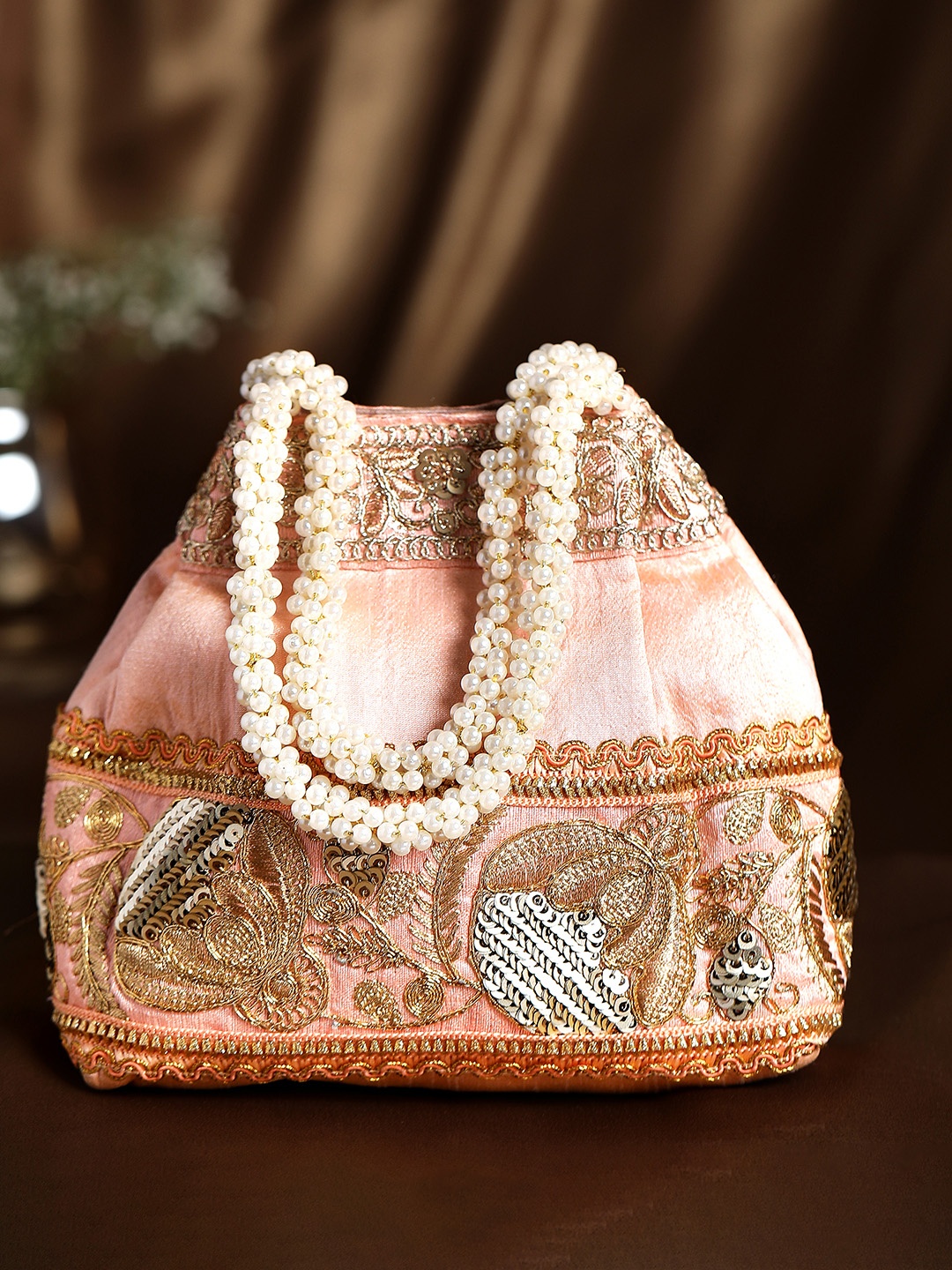 

Rubans Gold-Toned & Peach-Coloured Embroidered Potli Clutch