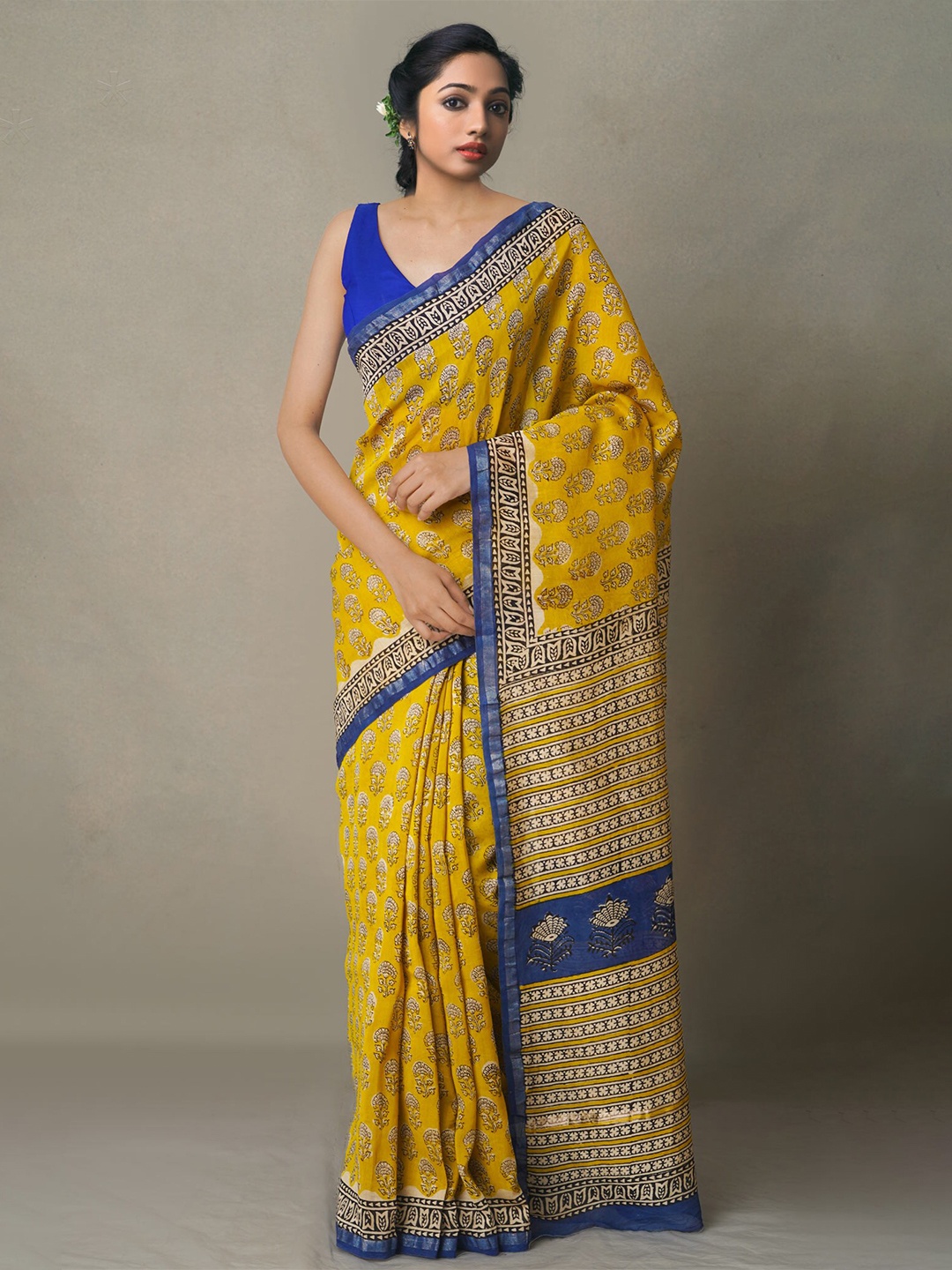 

Unnati Silks Yellow & Blue Ethnic Motifs Zari Silk Cotton Chanderi Saree