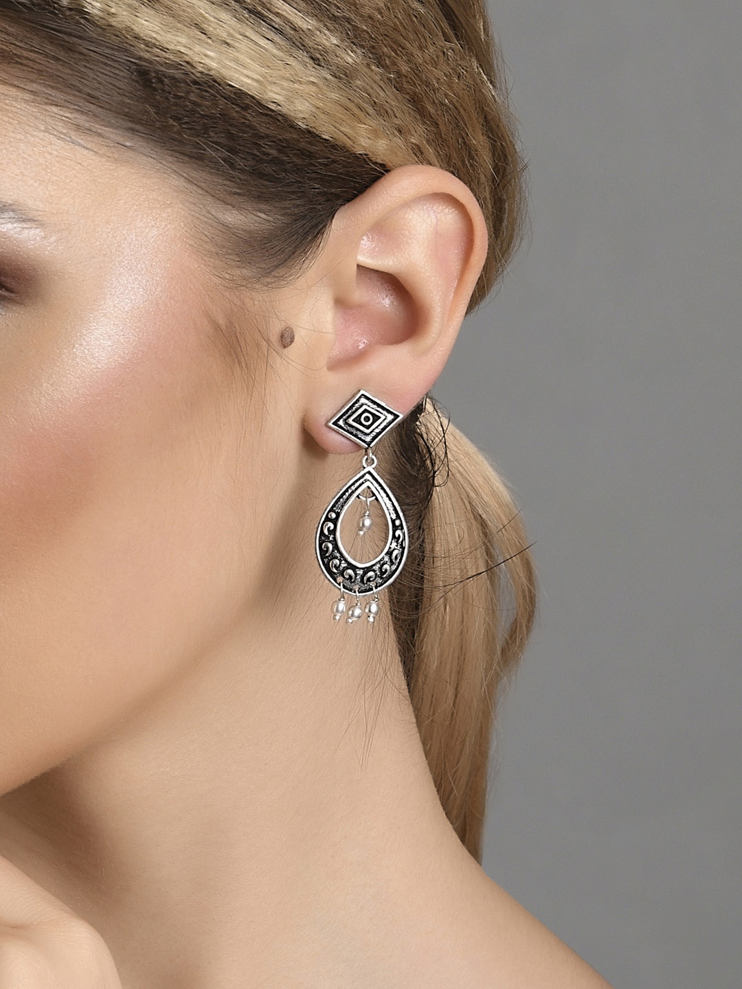 

Fida Silver-Toned Contemporary Drop Earrings