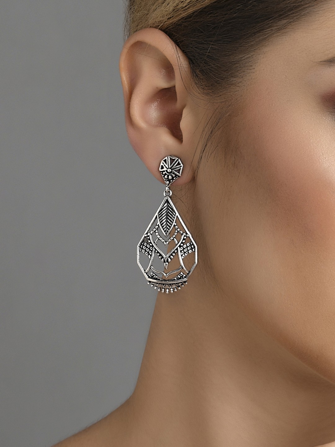 

Fida Silver-Toned Contemporary Drop Earrings