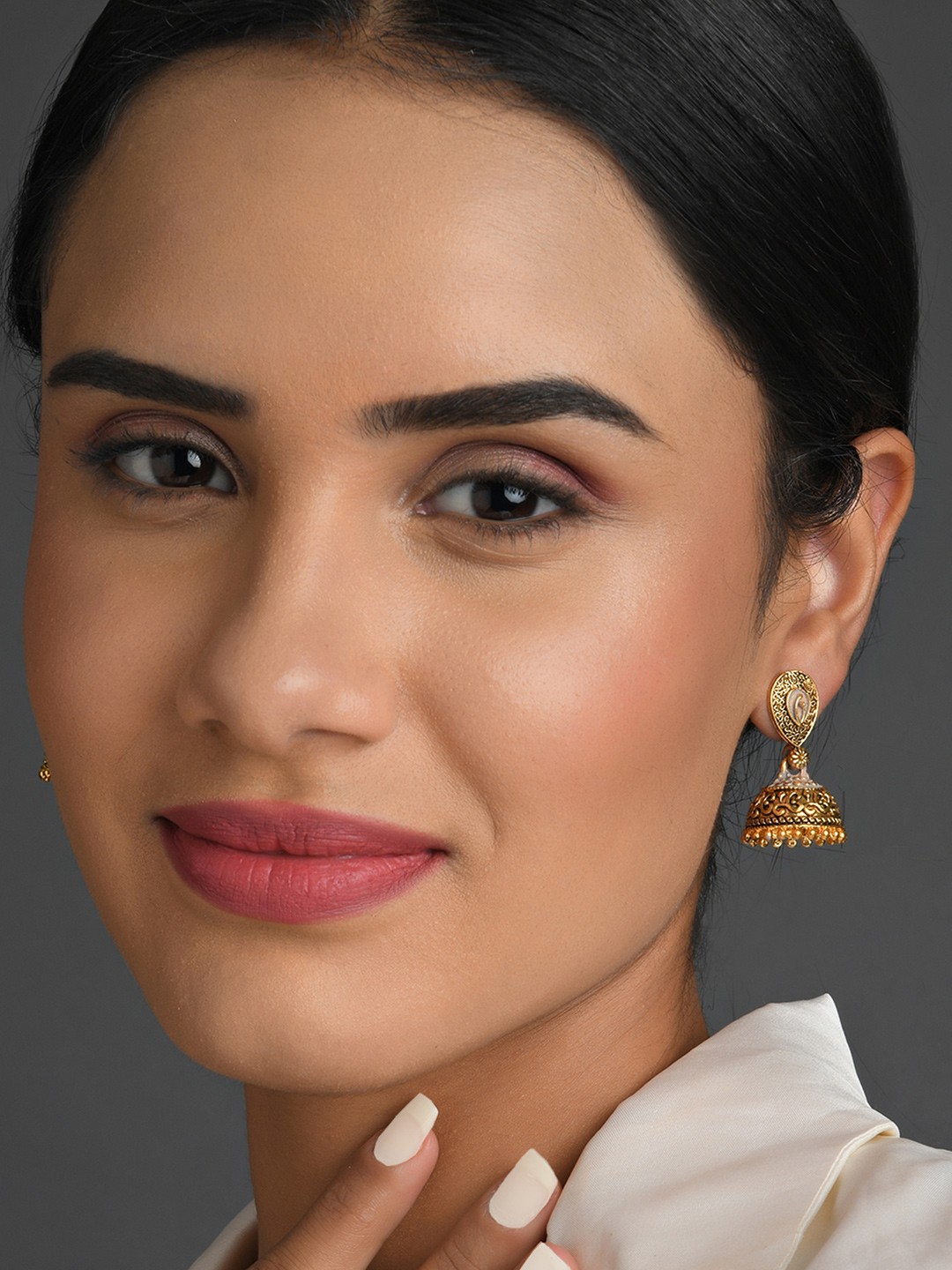 

Fida Gold Plated Contemporary Jhumkas Earrings