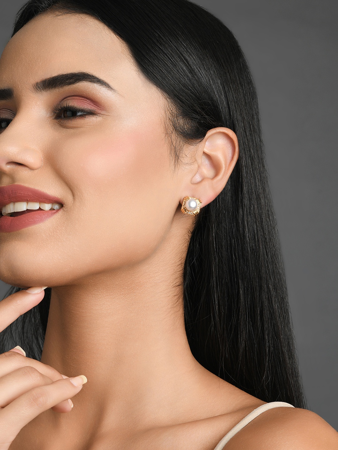 

Fida Gold-Plated & White Pearl Studded Contemporary Studs Earrings