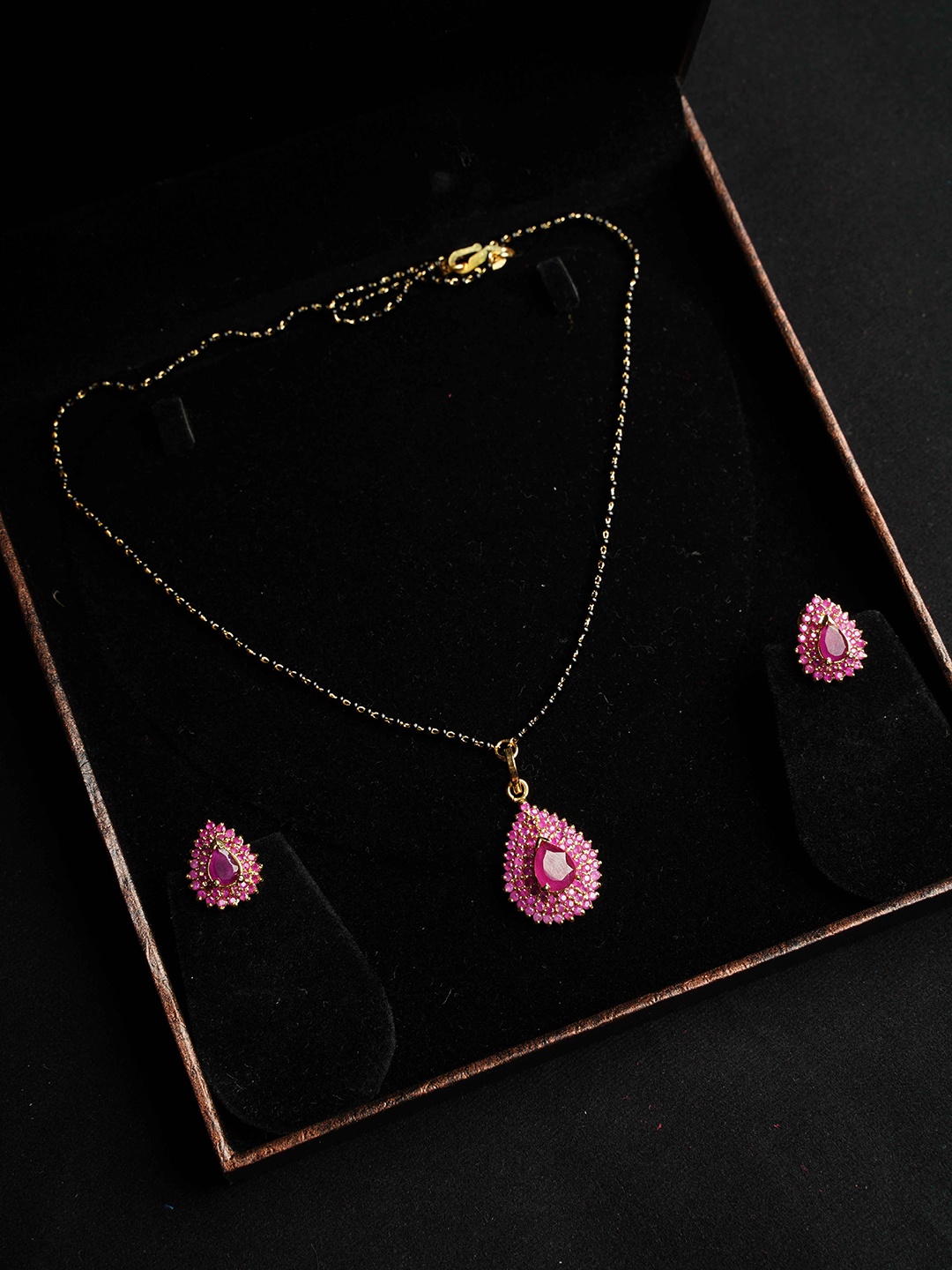 

NASTEE Rhodium-Plated Red CZ Stone-Studded Pendant Set Set With Earrings