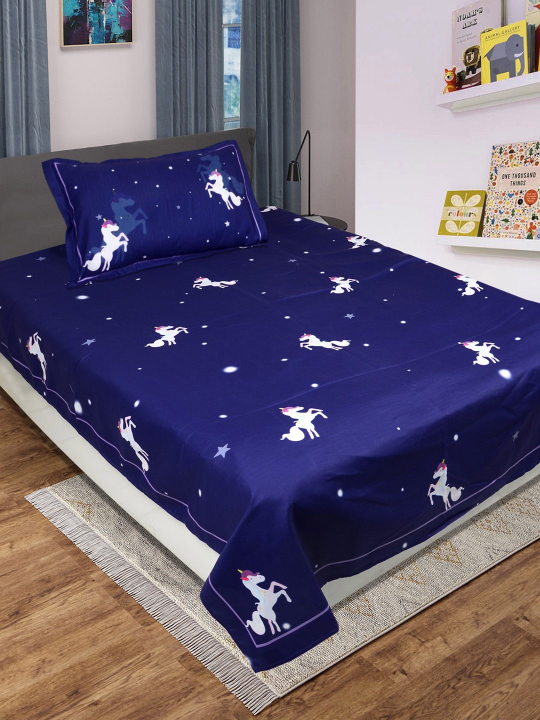 

Saral Home Blue & White Cartoon Characters 120 TC Single Bedsheet with 1 Pillow Covers