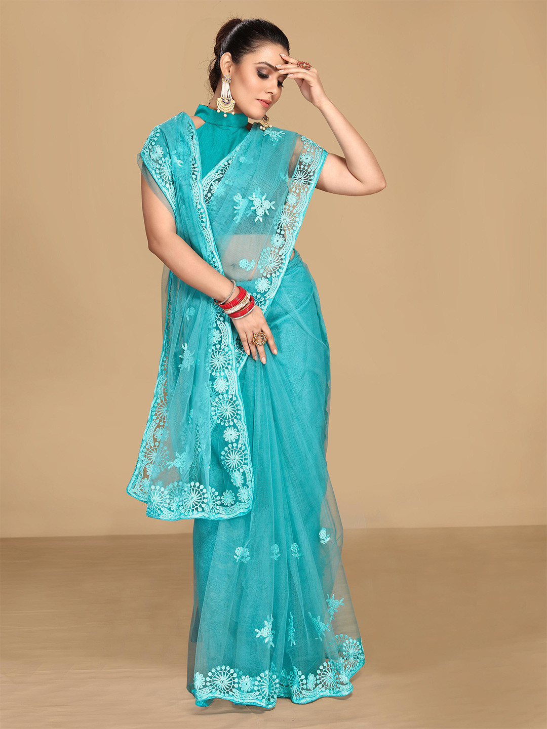 

VAIRAGEE Women Turquoise Blue Ethnic Motifs Embroidered Net Saree