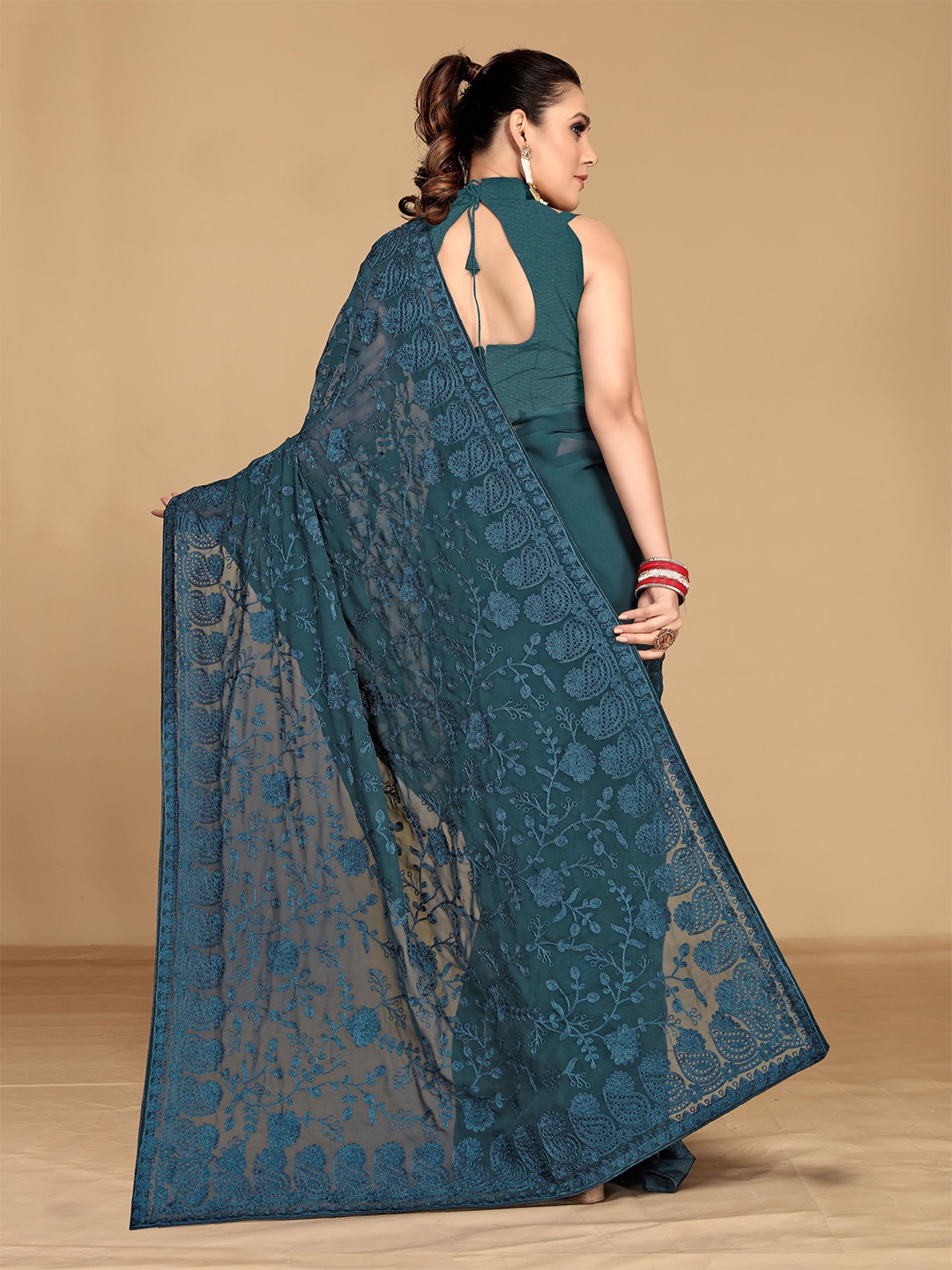 

VAIRAGEE Teal Embellished Embroidered Saree