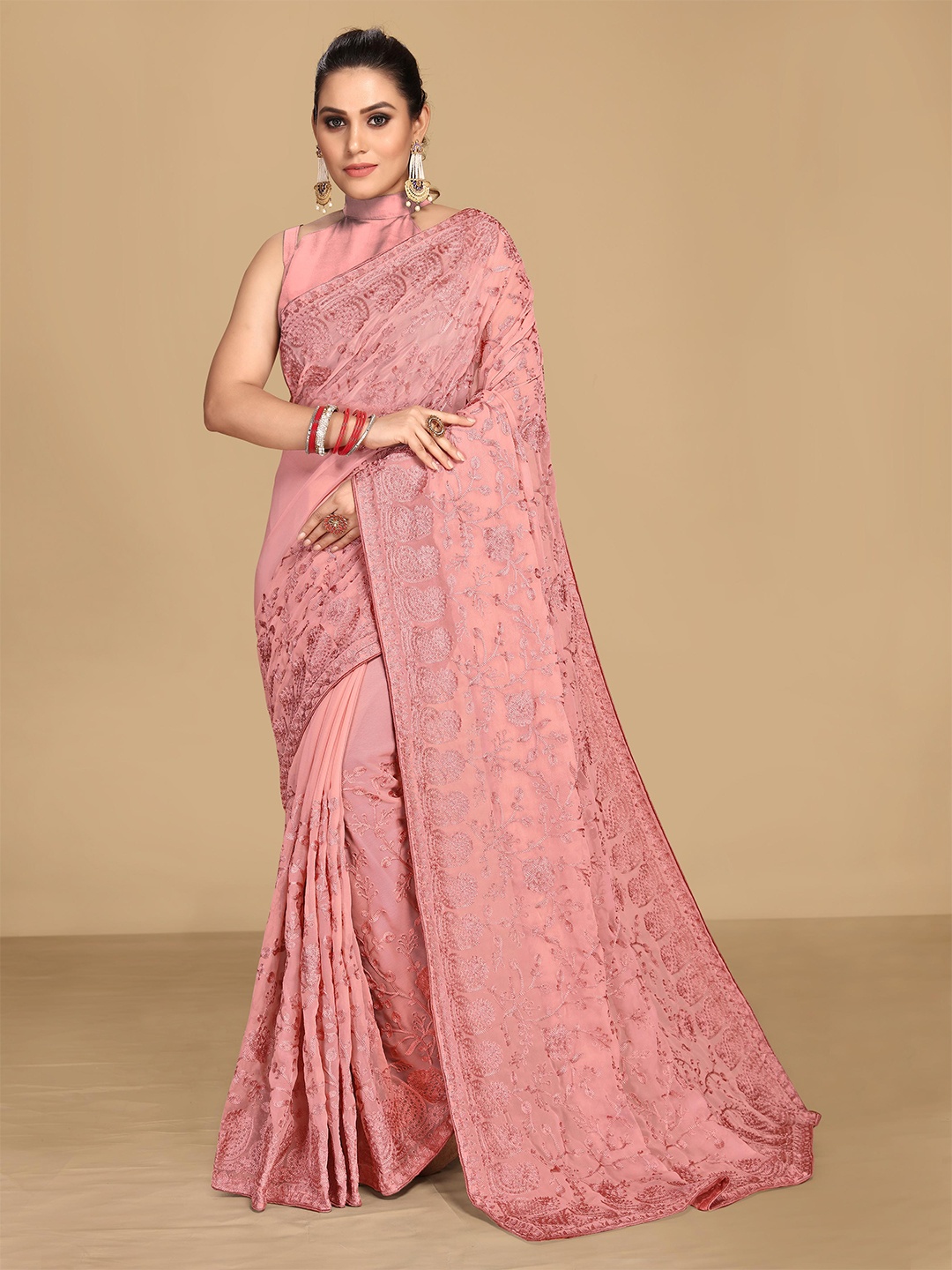 

VAIRAGEE Peach-Coloured Ethnic Motifs Embroidered Saree