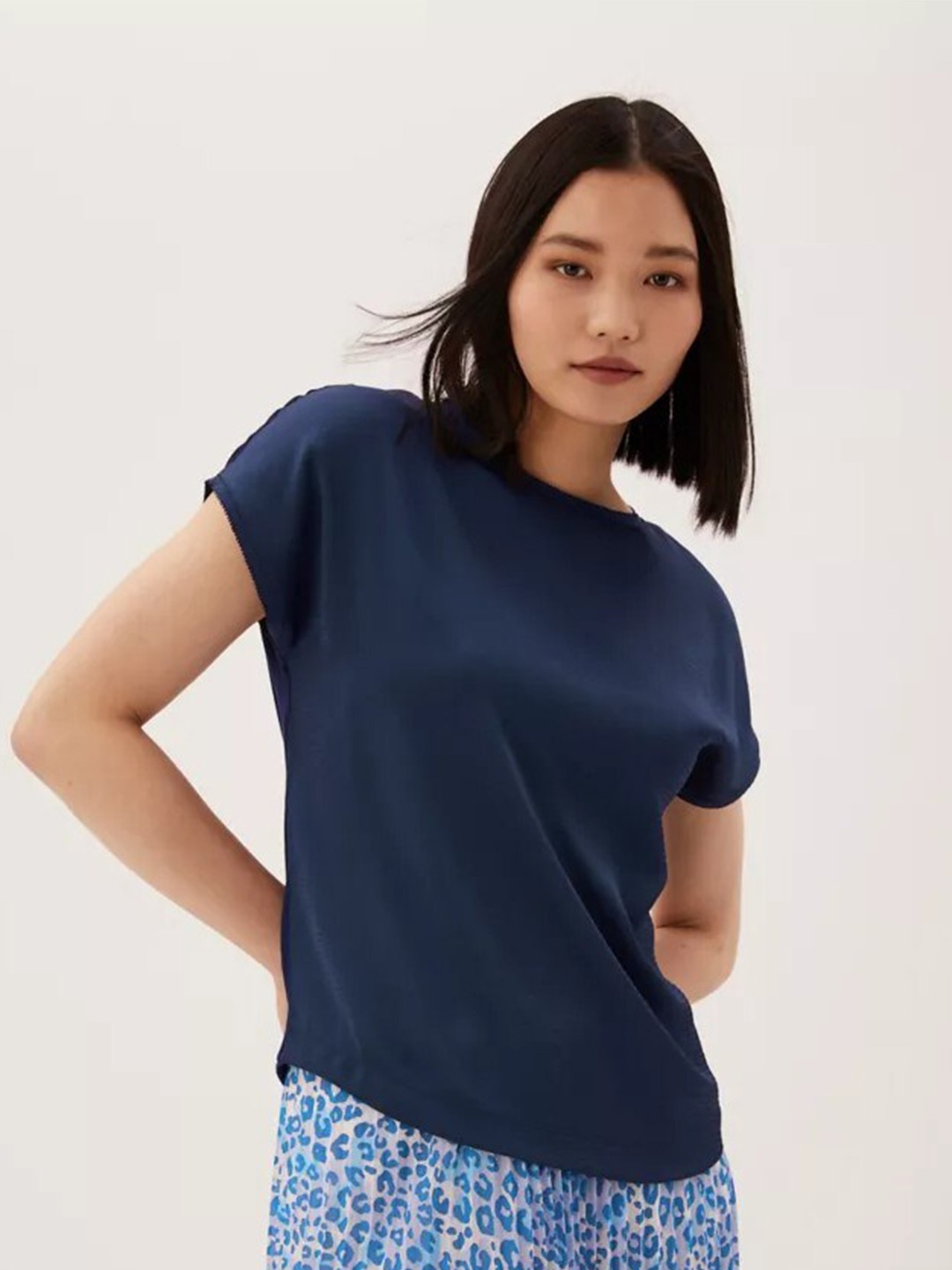 

Marks & Spencer Women Blue Solid Short Sleeves T-shirt