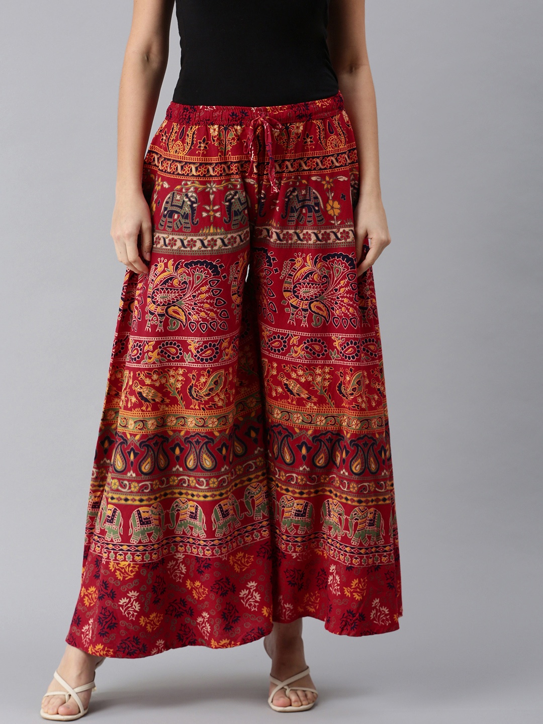 

ROOPWATI FASHION Women Red & White Ethnic Motifs Print Flared Palazzos