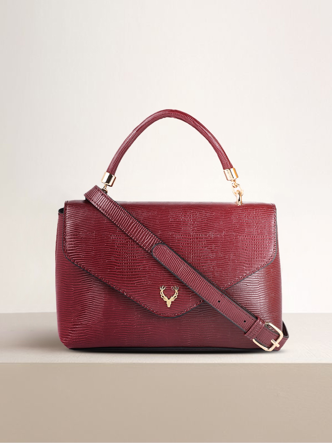 

Allen Solly Burgundy Animal Textured Structured Satchel