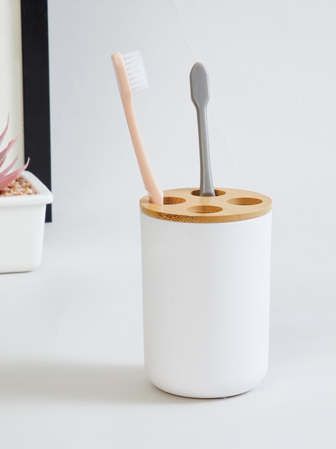 

Home Centre White Solid Tooth Brush Holder