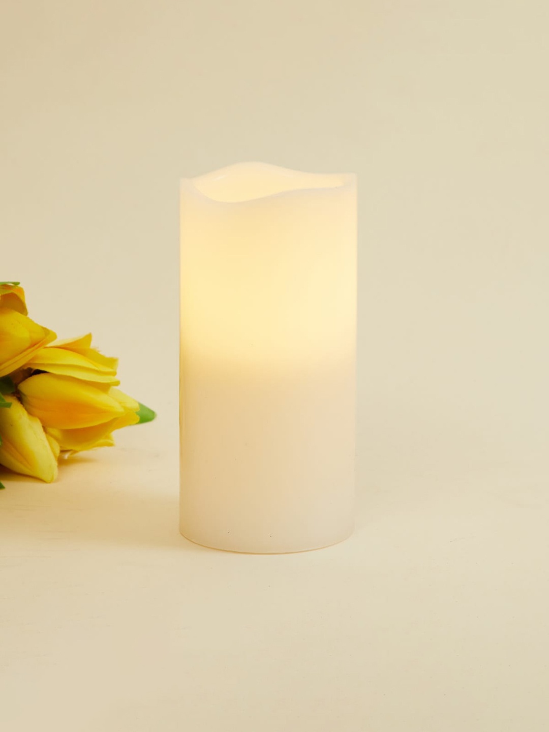 

Home Centre White Serena New Delight Solid LED Flameless Candle