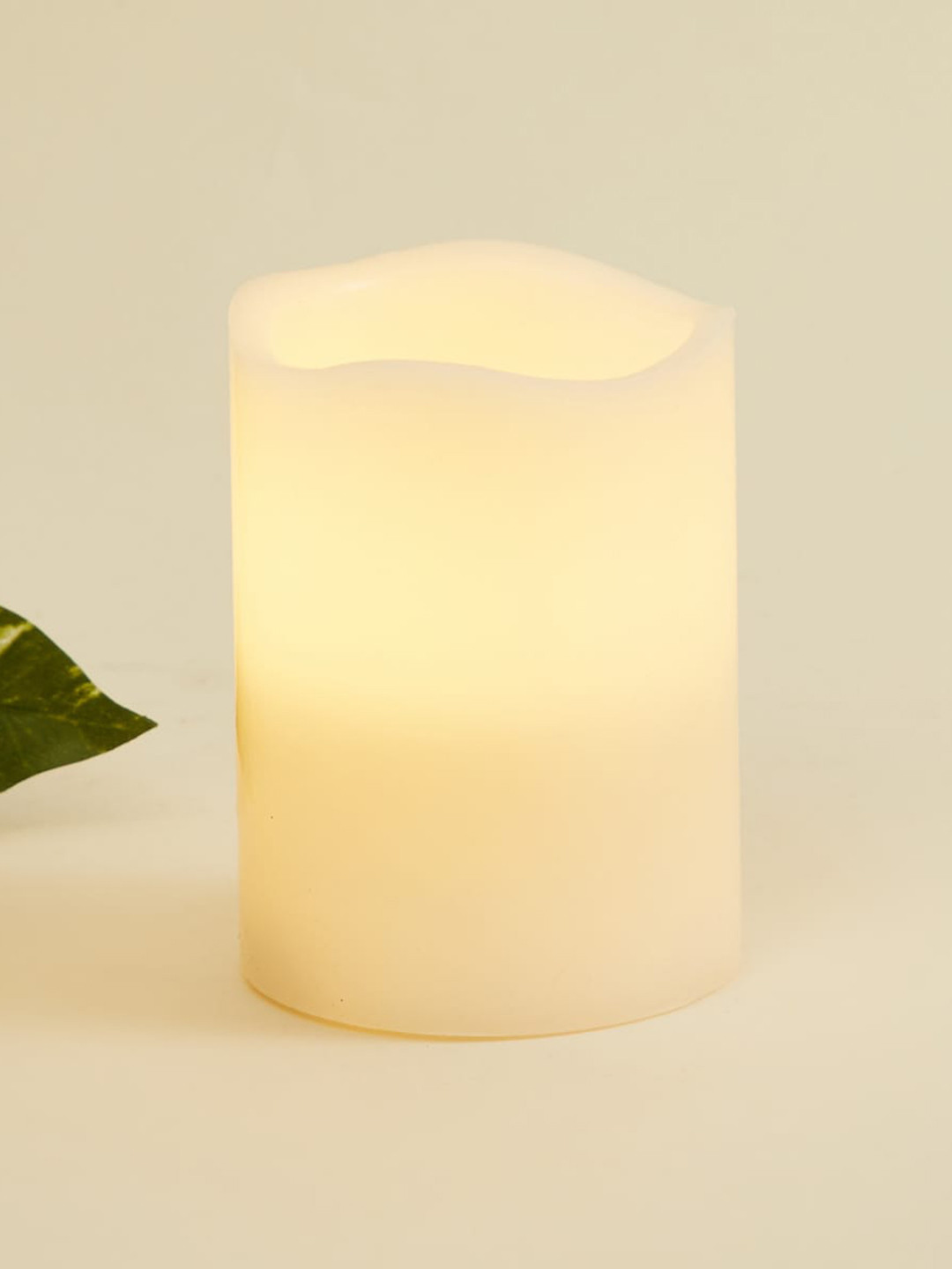 

Home Centre Off White Serena New Delight Solid Wax LED Flameless Candle