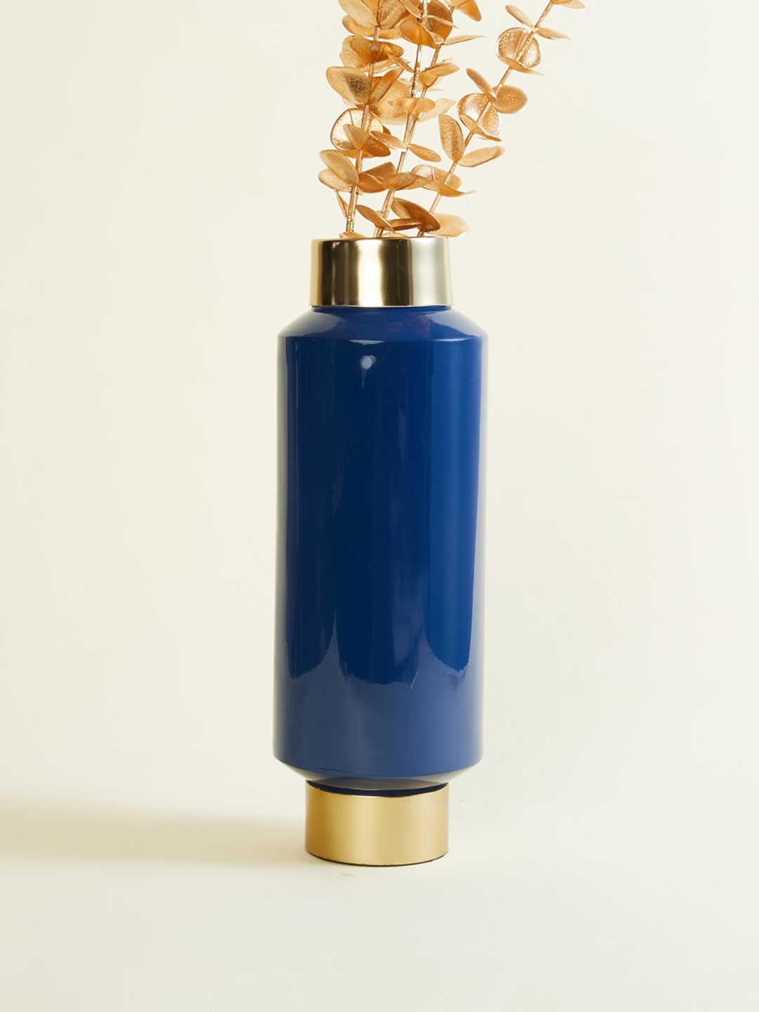 

Home Centre Blue Solid Metal Long Vase