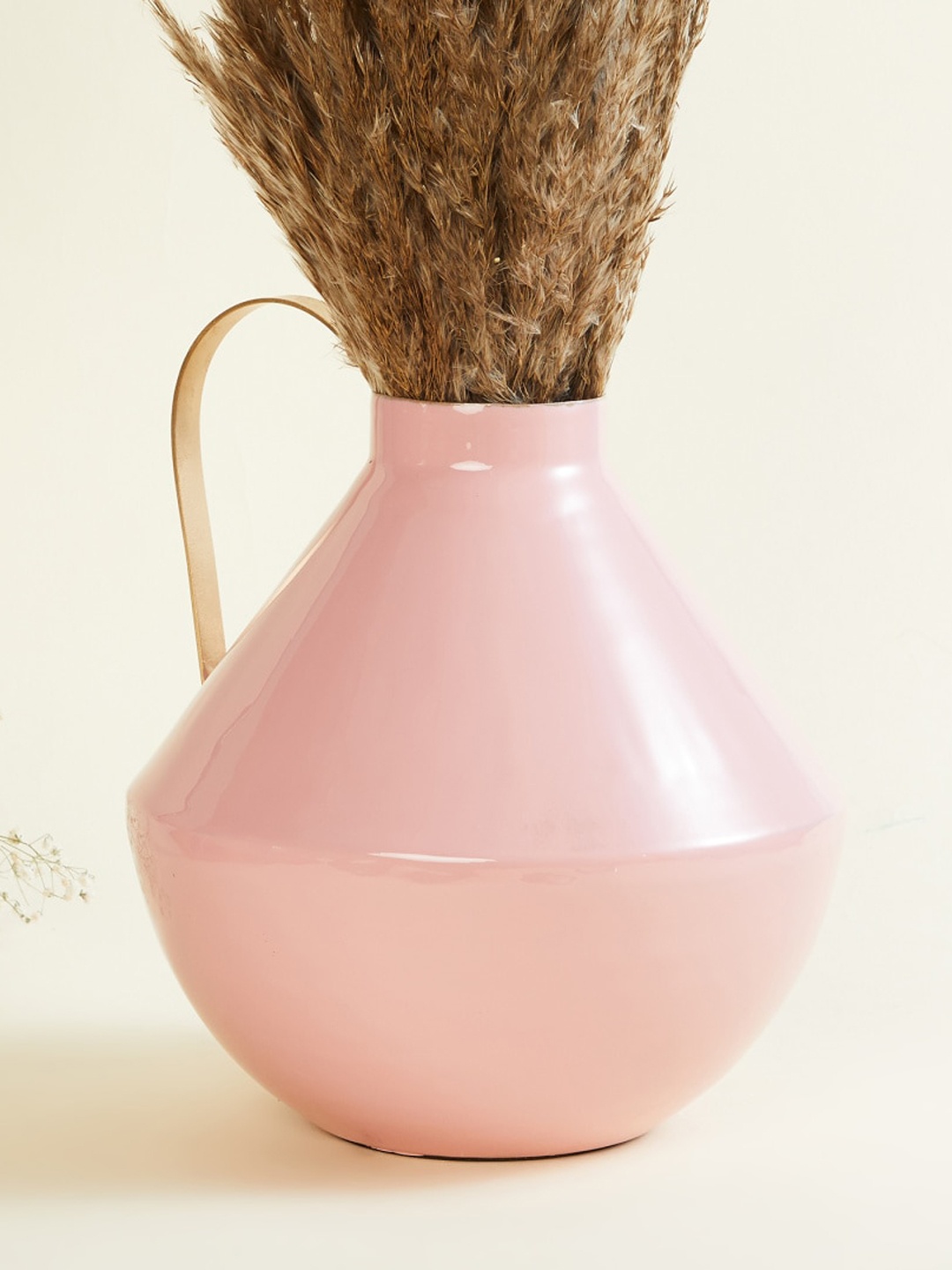 

Home Centre Pink Splendid Solid Metal Abstract Vase
