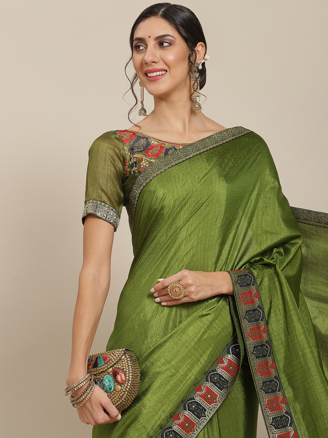 

Mitera Green & Navy Blue Dyed Celebrity Saree