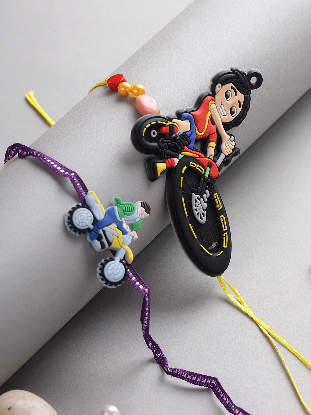 

Aapno Rajasthan Kids Set of 2 Boy on Cycle Rakhi, Multi
