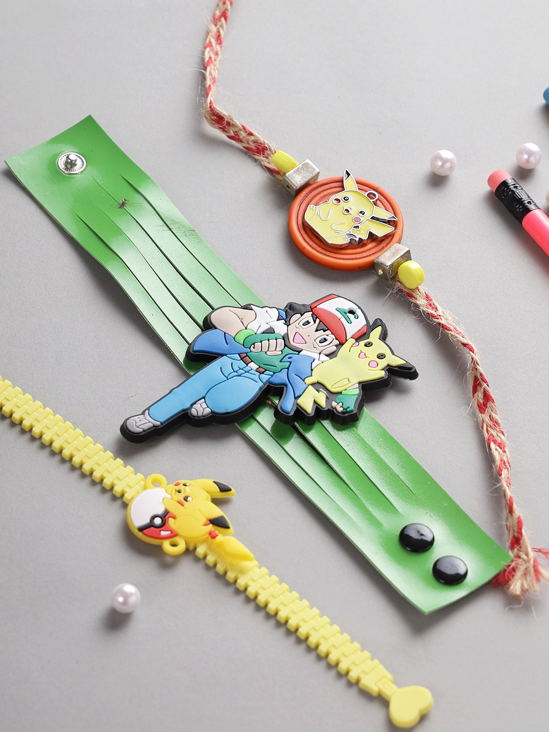 

Aapno Rajasthan Kid Set Of 3 Blue & Red Pikachu-Studded Rakhi, Yellow