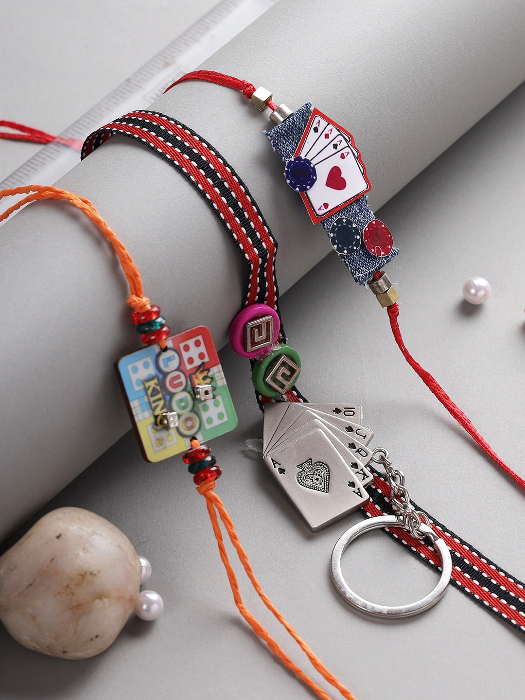 

Aapno Rajasthan Kids Set Of 3 Orange And Red Rakhi