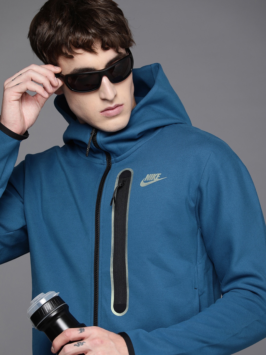 

Nike Men Blue Solid Sporty Jacket