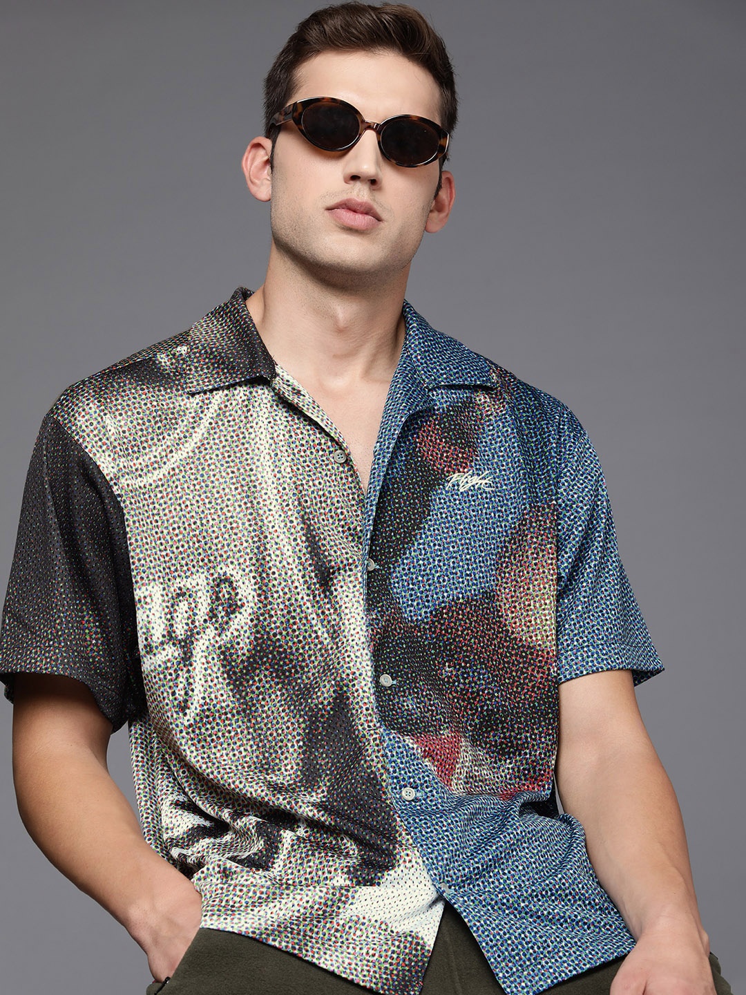 

Nike Men Black Graphic Printed Casual Shirt