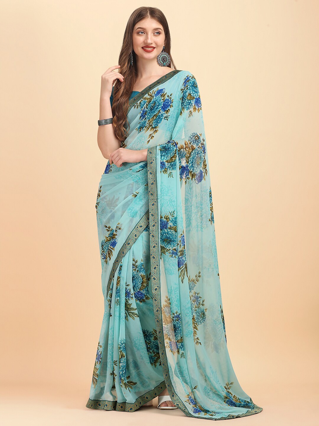 

Sangria Blue & Green Floral Saree With Unstitched blouse piece
