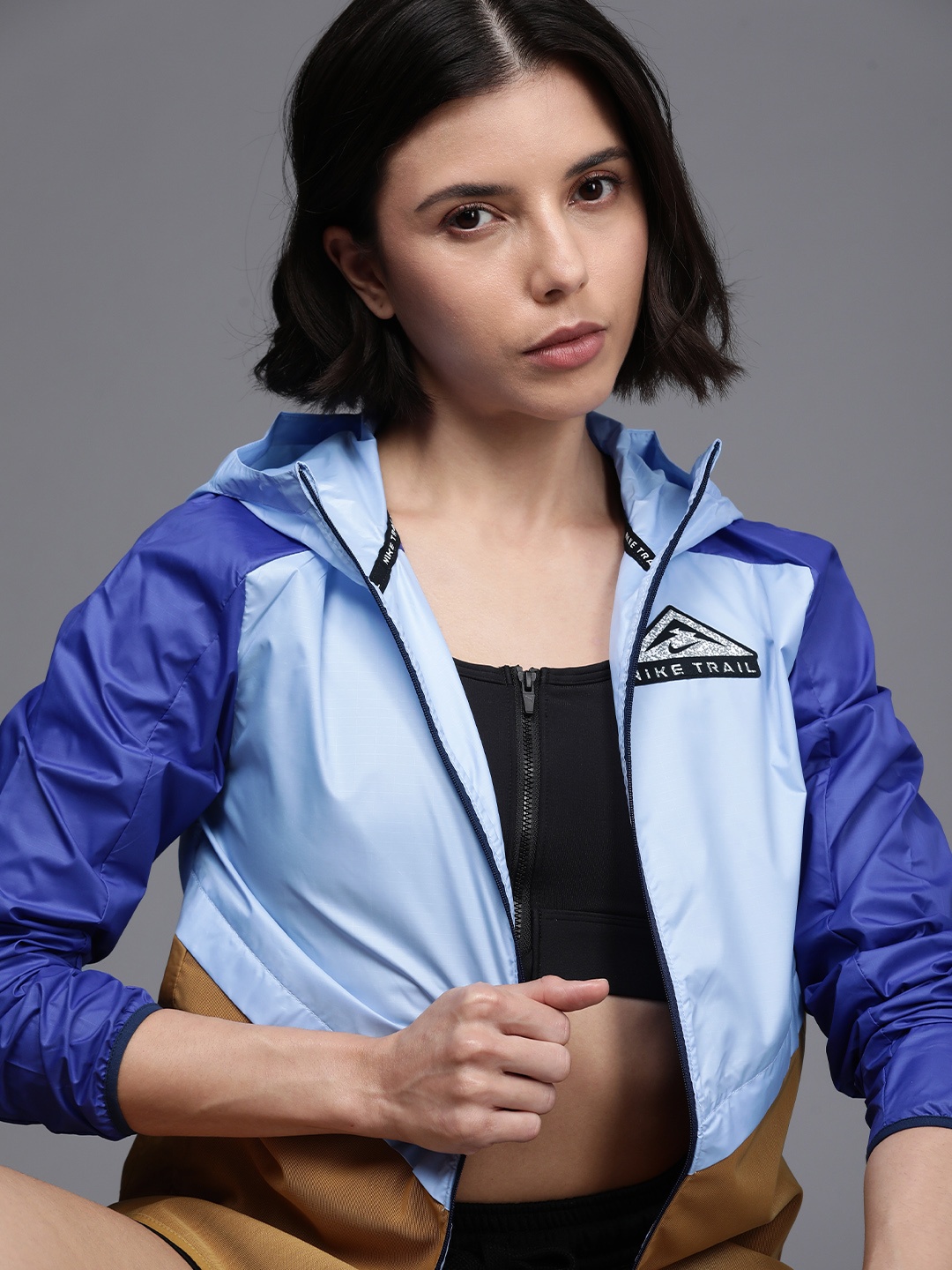 

Nike Women Blue & Brown Colourblocked Running Sporty Jacket