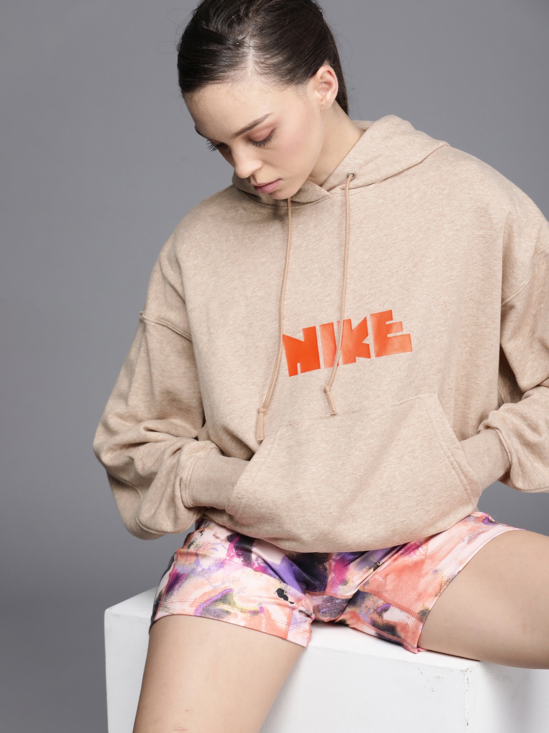 

Nike Women Brown & Ornage Printed Hooded Sweatshirt