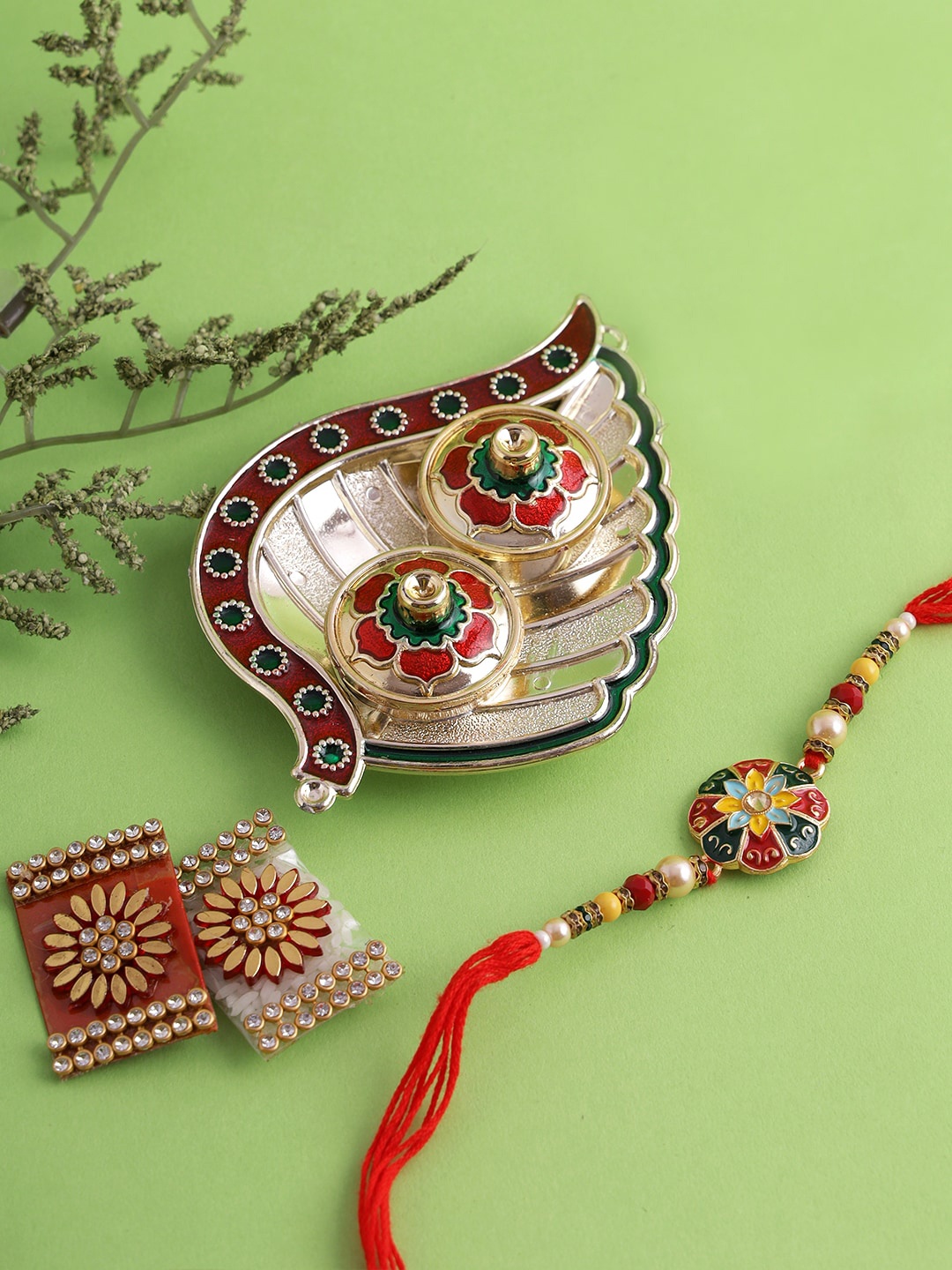 

Aapno Rajasthan unisex Gold-Toned & Red Beaded Rakhi
