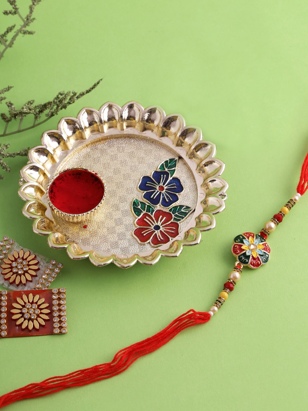 

Aapno Rajasthan Gold-Toned Floral Rakhi Gift Set