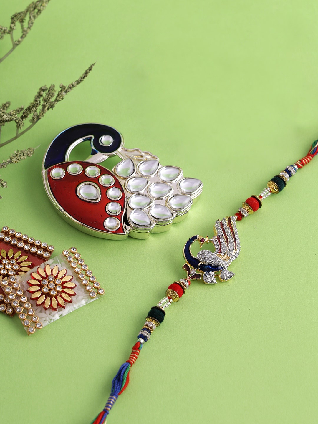 

Aapno Rajasthan Peacock Motif Bhaiya Rakhi with Roli Chawal Box, Red
