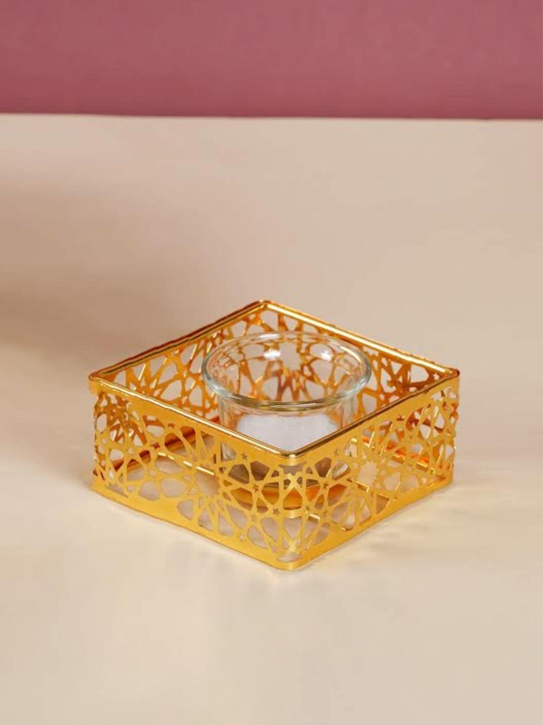 

Nestasia Gold & Transparent Square Metal And Glass Candle Stand