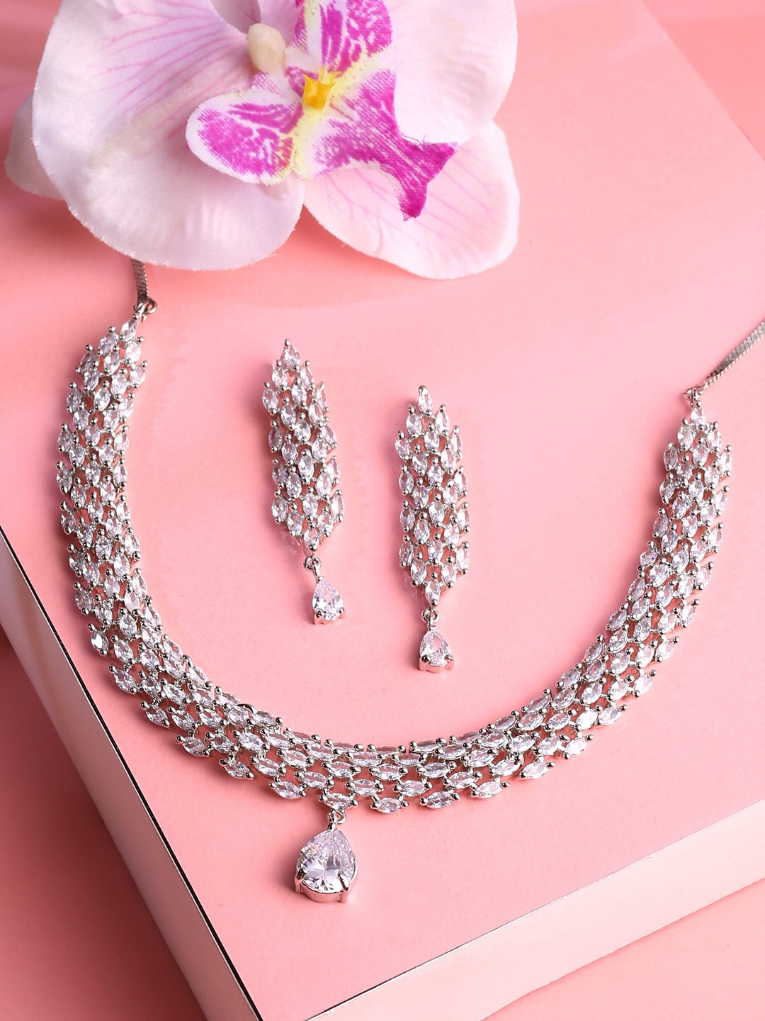 

Yellow Chimes Silver-Plated Silver-Toned White AD Studded Jewellery Set