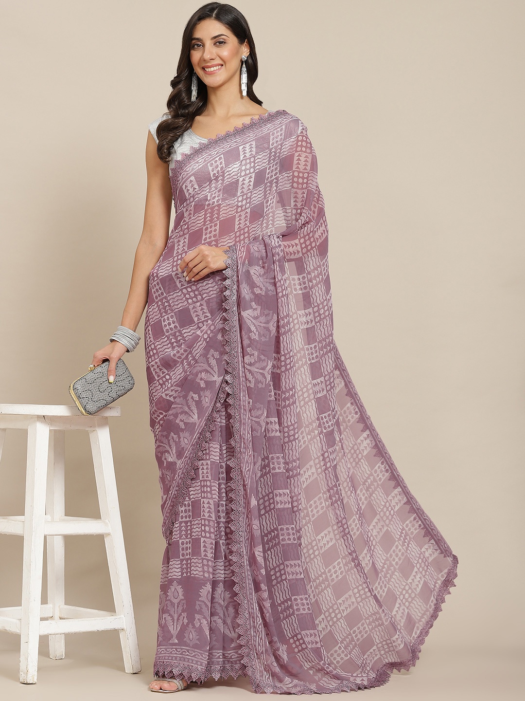 

Tikhi Imli Mauve Batik Saree With Chikankari Lace