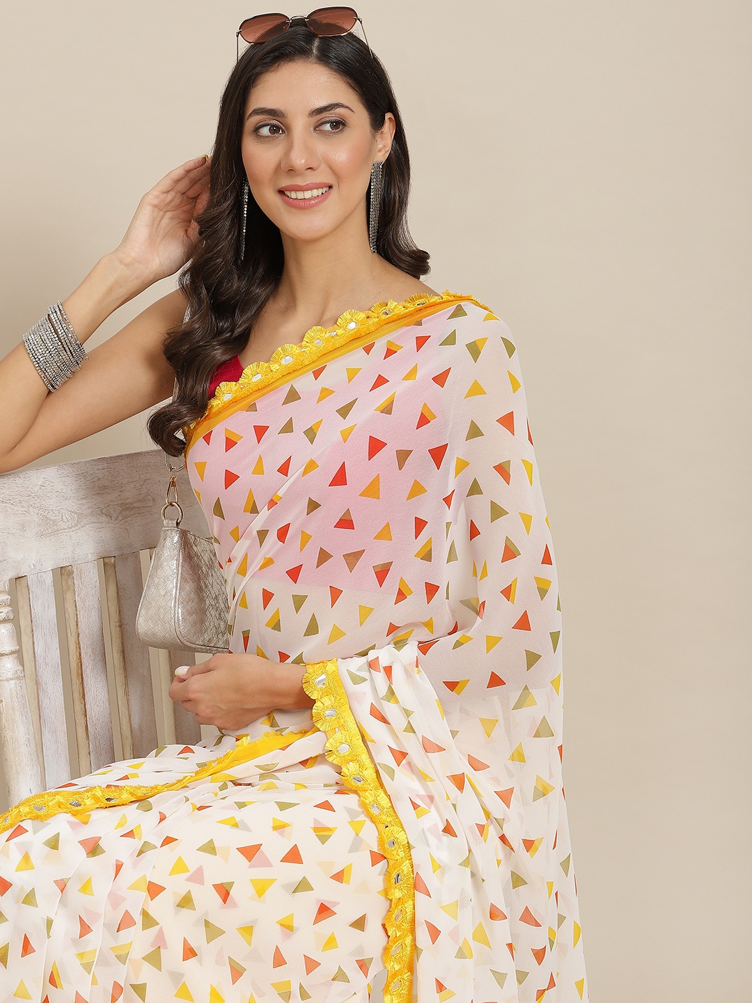 

Tikhi Imli Off White & Yellow Mirror Work Saree