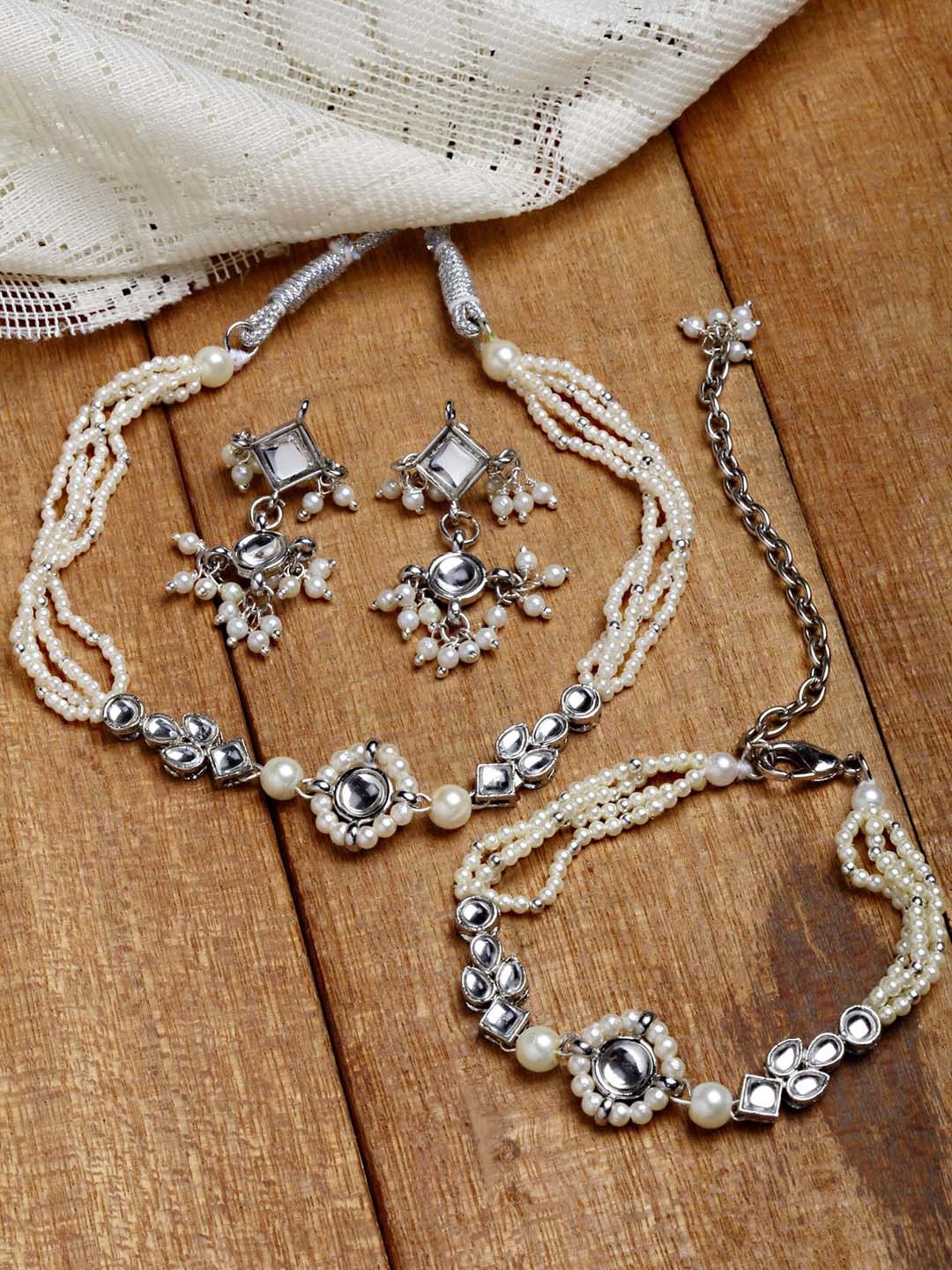 

KARATCART White & Silver-Plated Kundan Studded Oxidised Jewellery Set