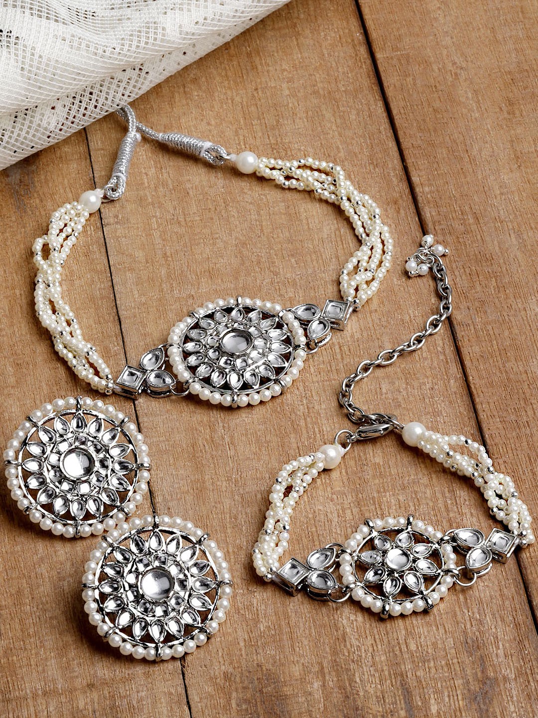 

KARATCART Silver-Plated White Kundan Studded & Beaded Jewellery Set