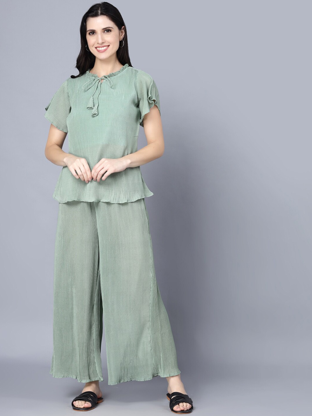 

Myshka Women Green Kurti with Palazzos