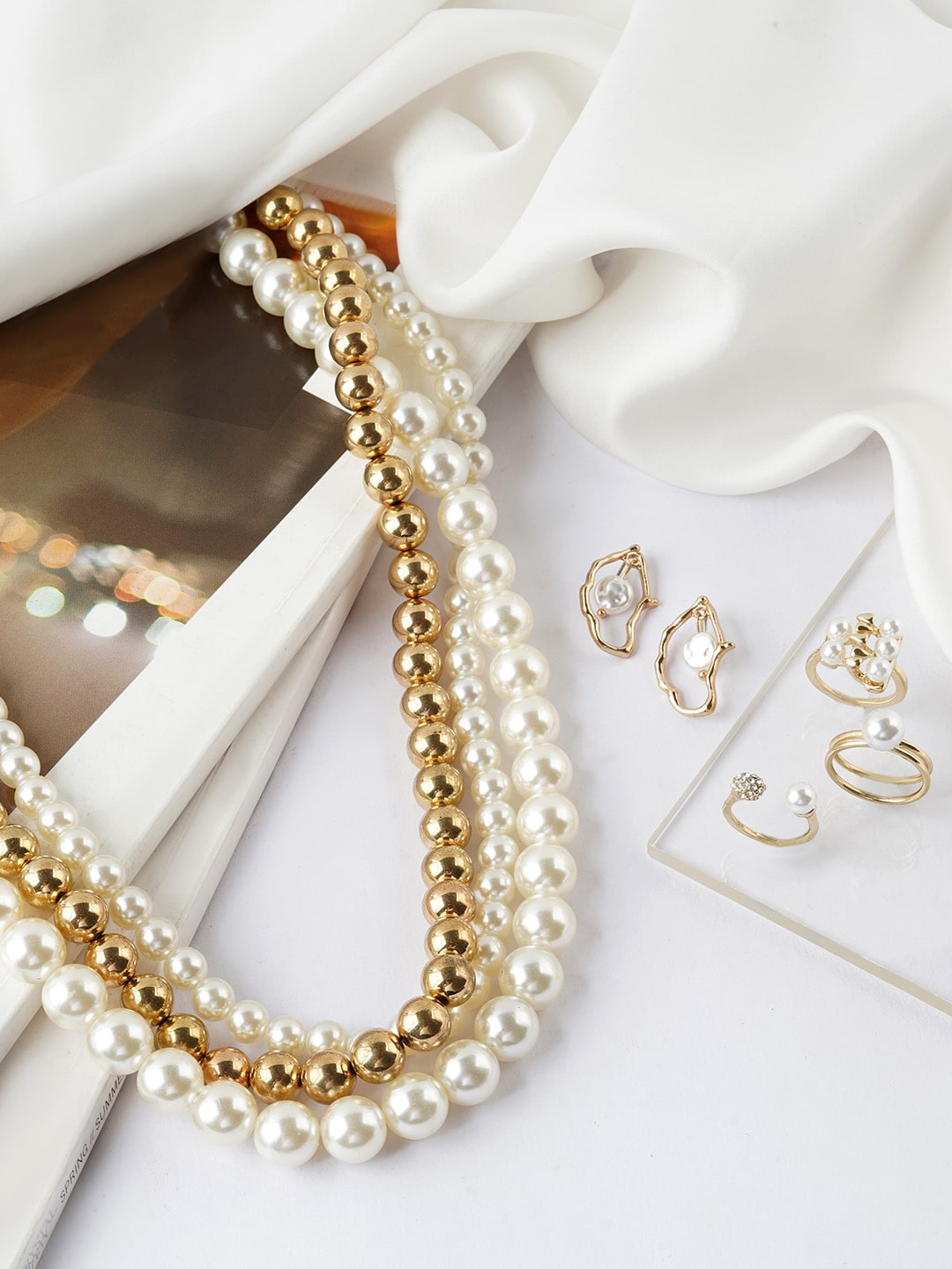 

JOKER & WITCH Women Gold-Toned & White Pearl Beaded Jewellery Set
