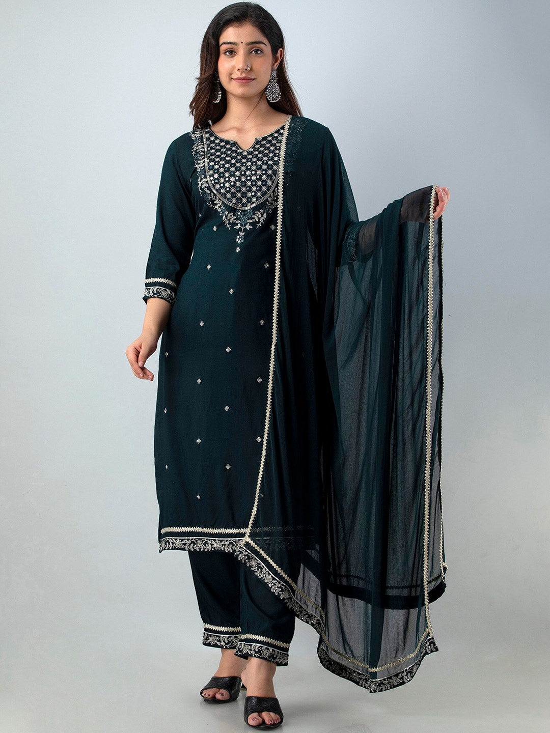 

Charu Women Teal Ethnic Motifs Kurta with Trousers