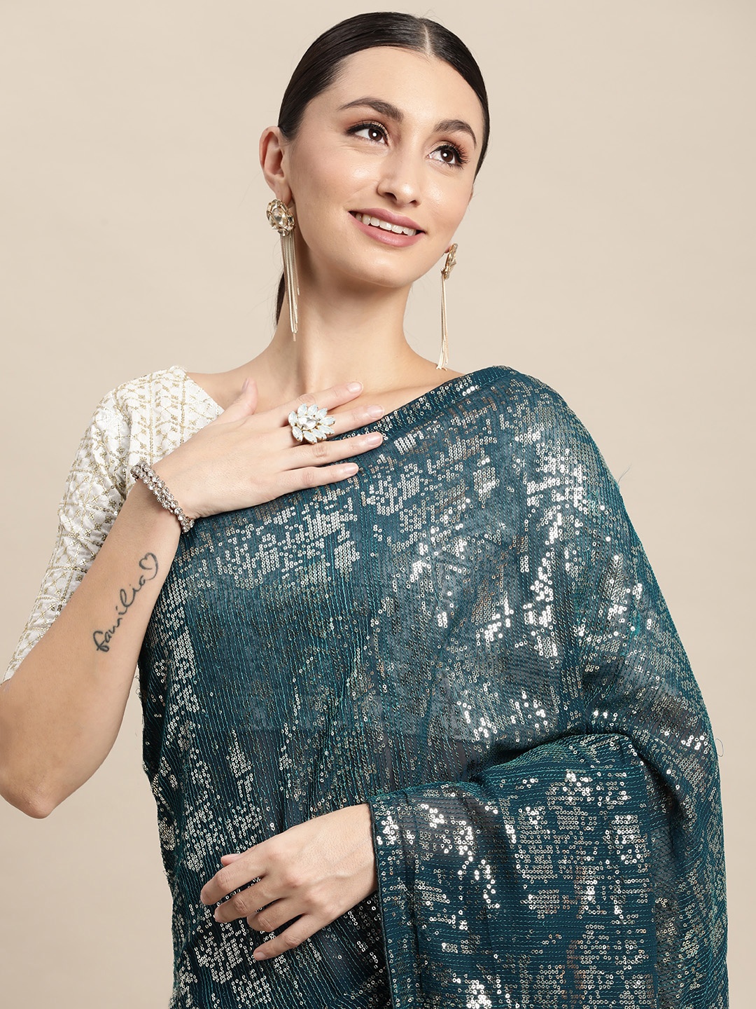 

VAIRAGEE Teal Blue Abstract Embroidered Saree
