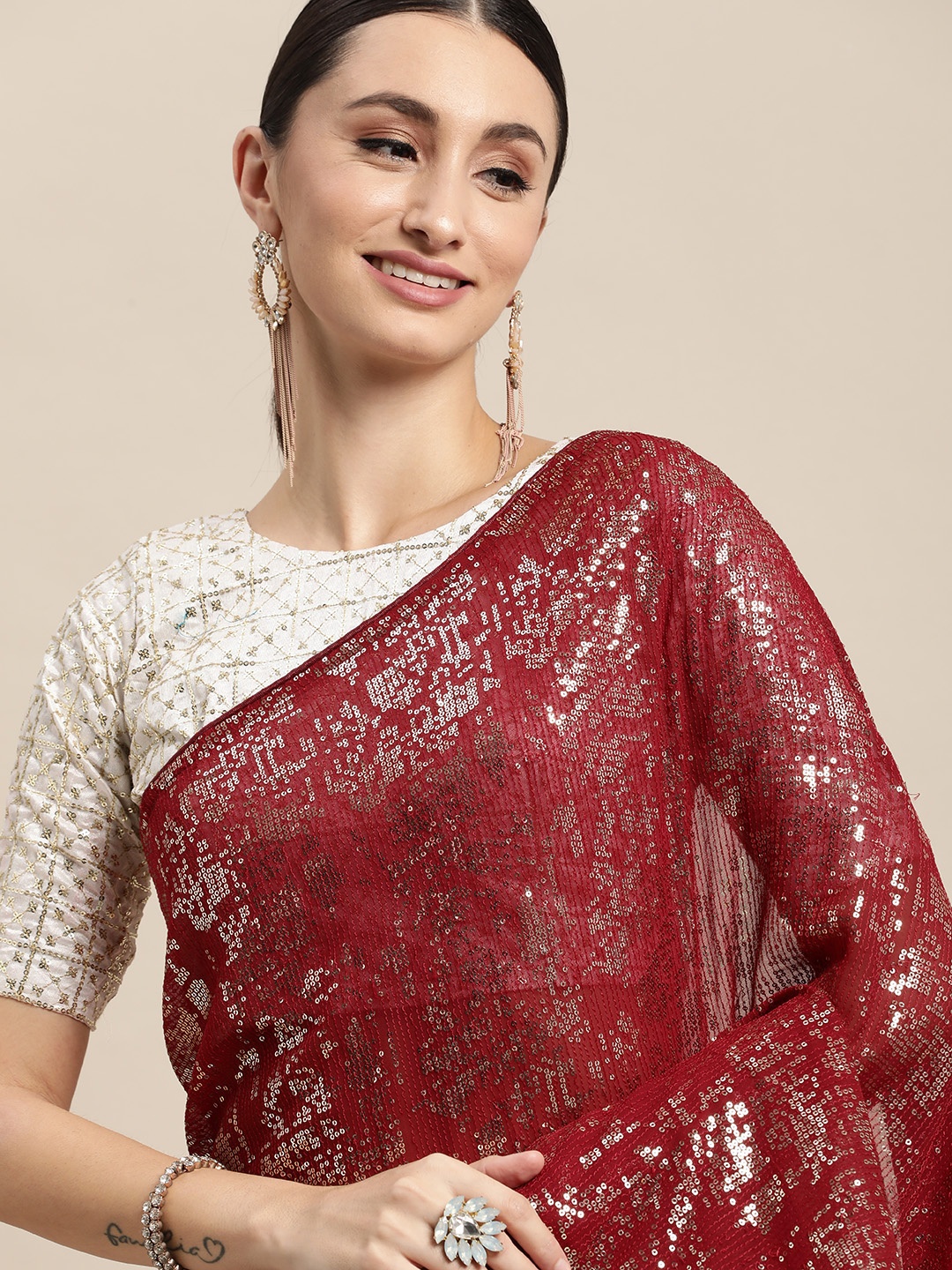 

VAIRAGEE Maroon Abstract Embroidered Saree