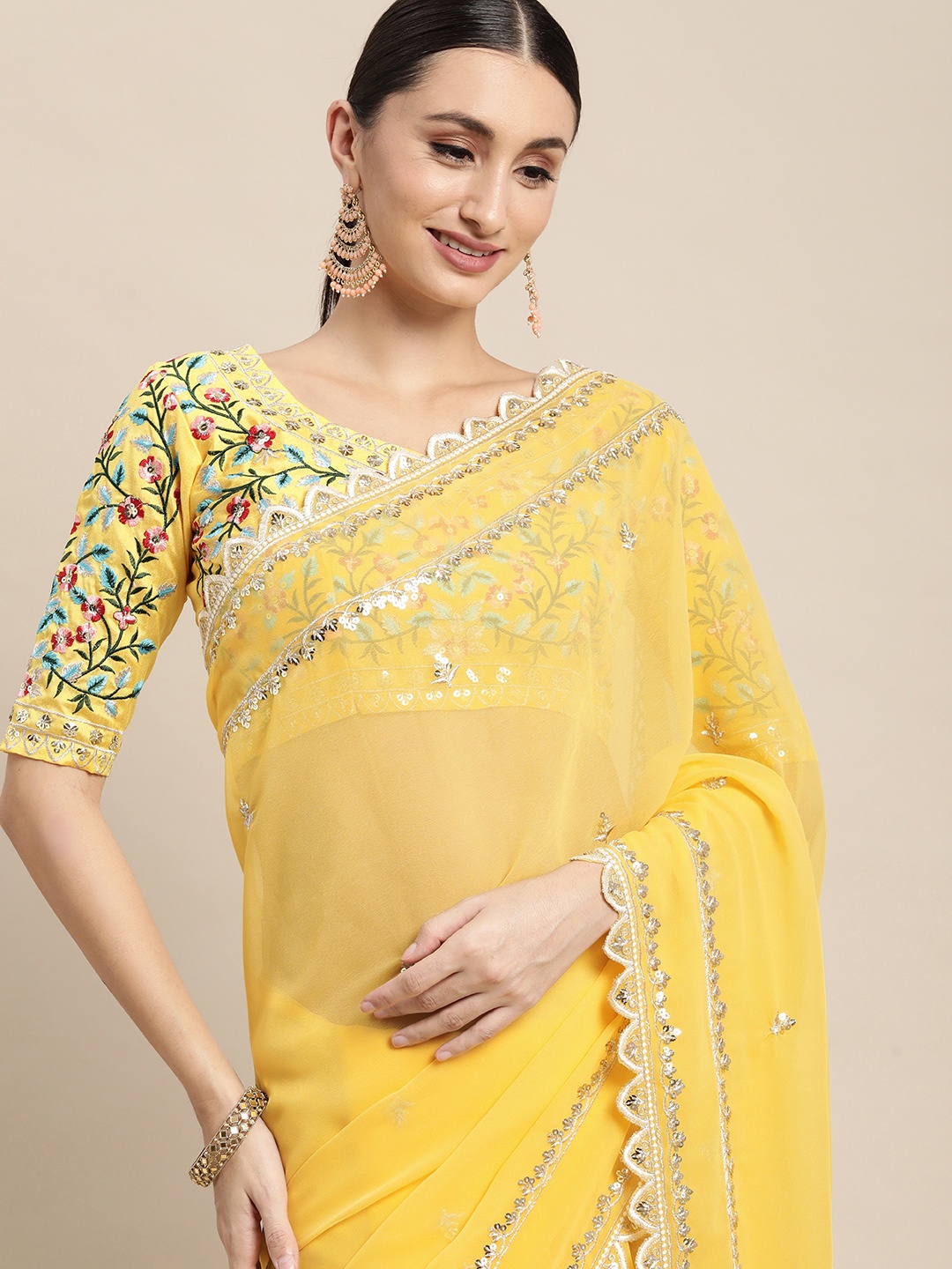 

VAIRAGEE Yellow Floral Embroidered Saree