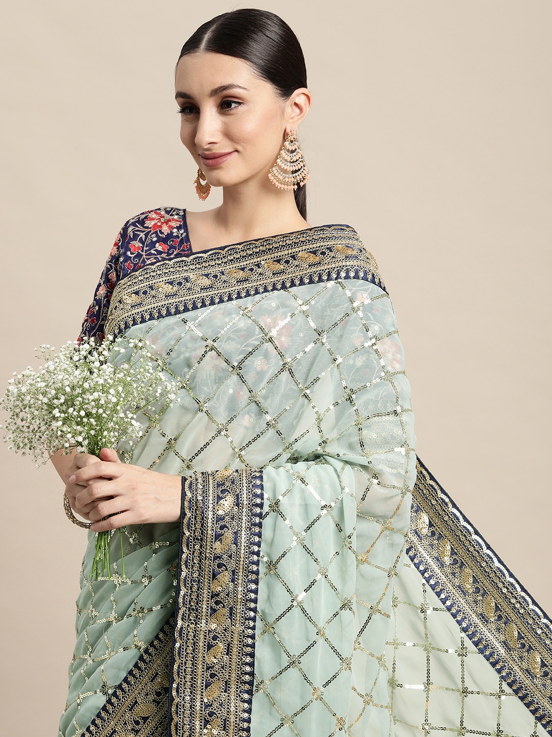 

VAIRAGEE Blue Geometric Embroidered Saree