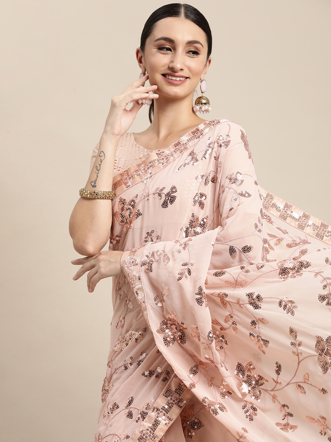 

VAIRAGEE Peach-Coloured Floral Sequinned Saree