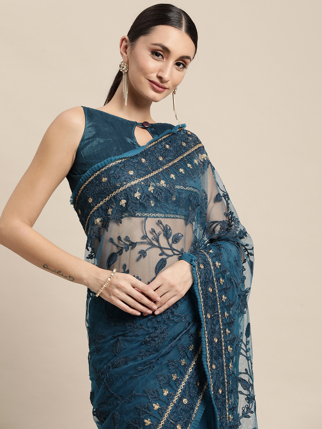 

VAIRAGEE Teal Blue Floral Embroidered Net Saree