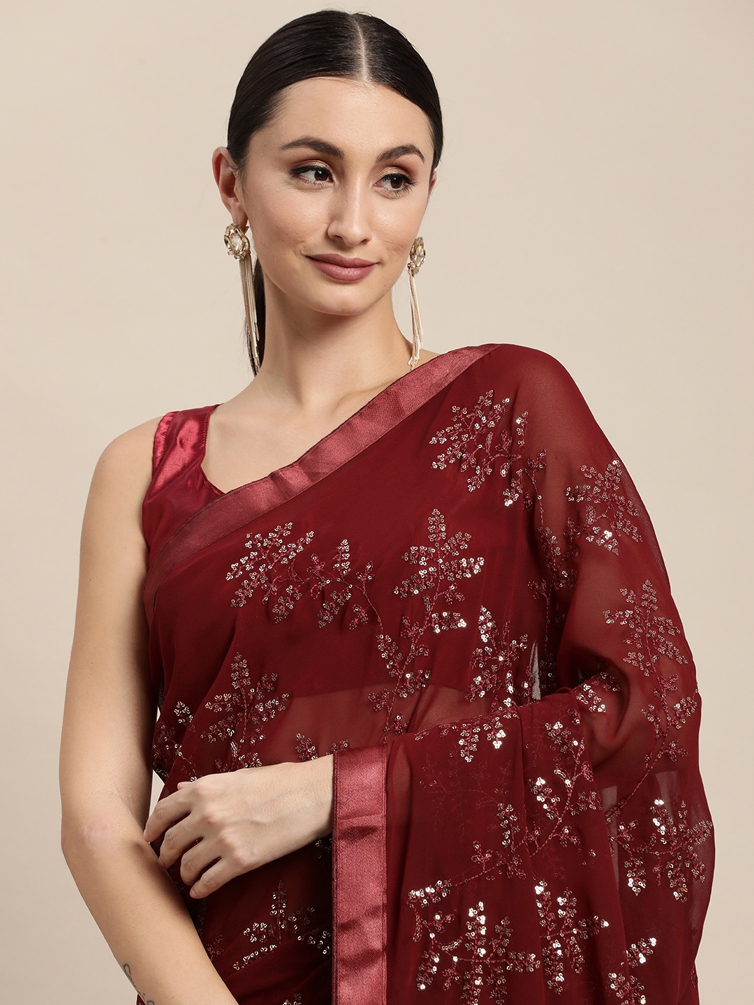 

VAIRAGEE Maroon Floral Embroidered Saree